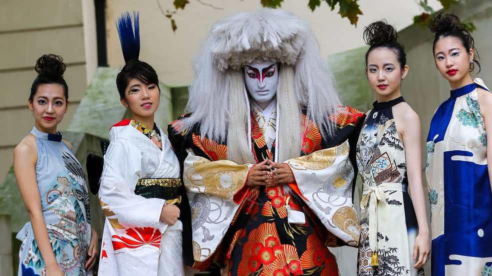 People dressed in Asian costume